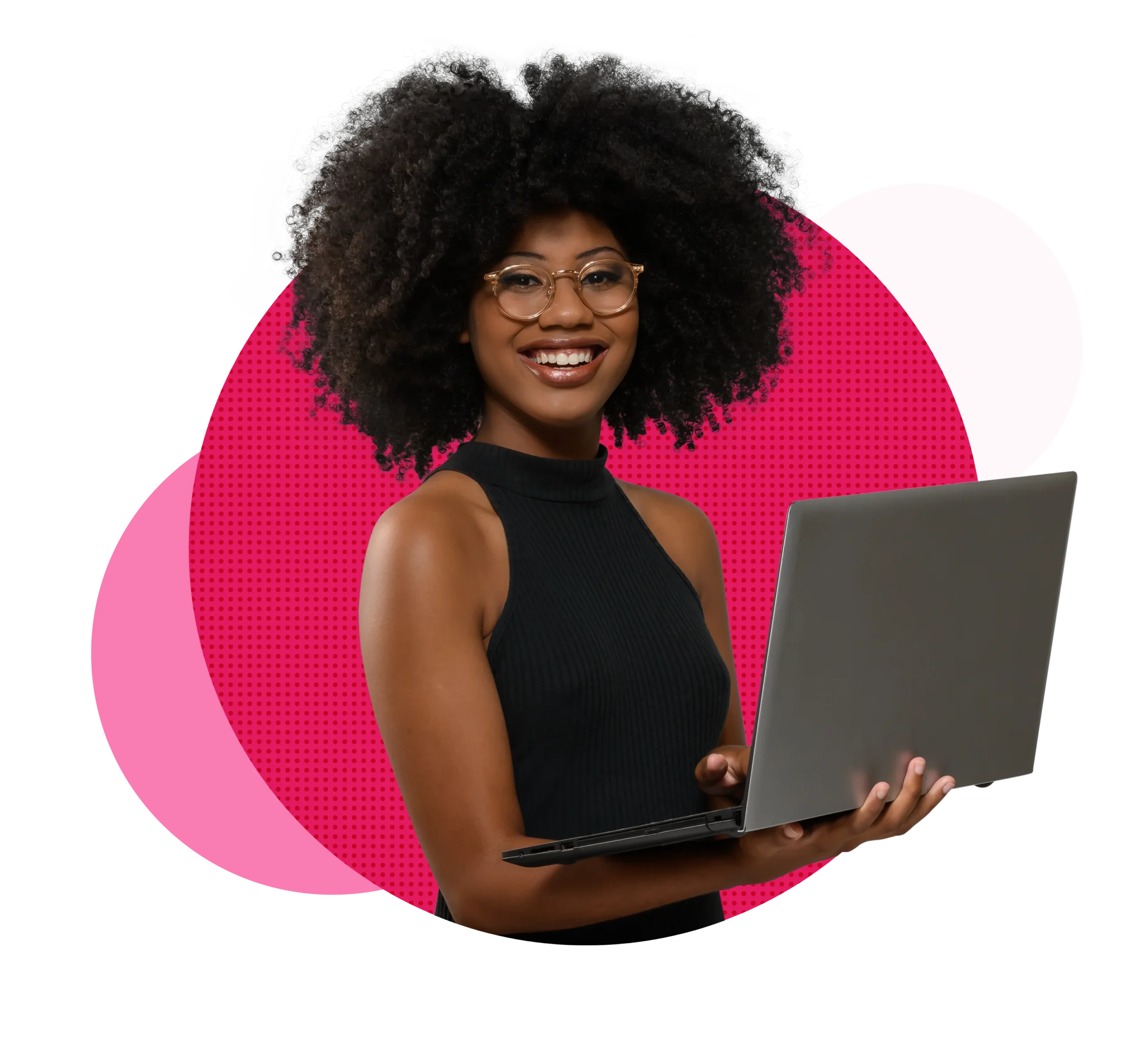 Young woman smiling at the camera and holding a laptop
