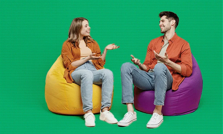 Two people on beanbags talking -  scenario-based elearning